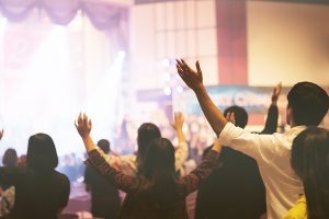 Christian Worship With Raised Hand In Church,music Concert.