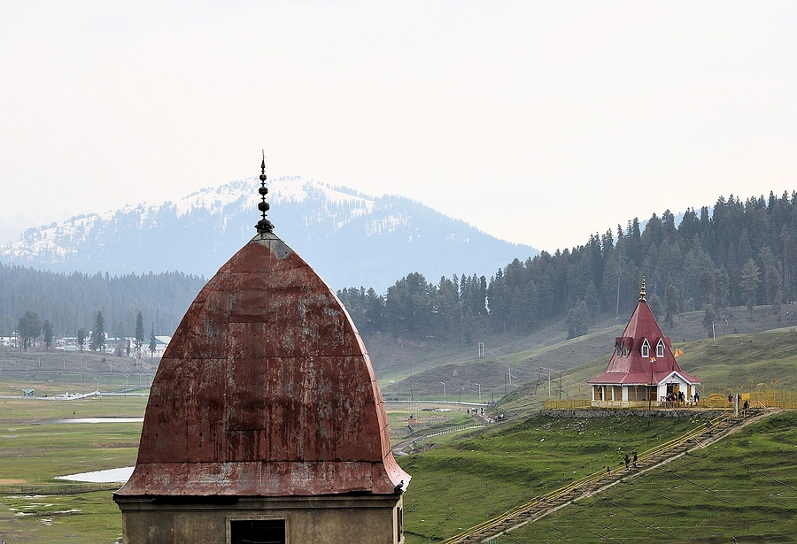 Mosque and Hindu temple in mountains of Kashmir