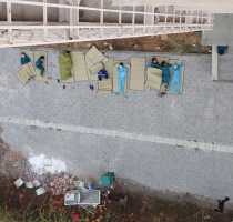 Resting Workers outside a Centralized Quarantine Facility for Vietnamese Returnees, March 2020  (Credit: Thanh Vu’s facebook posting, reproduction with the permission of Vũ Phương Thanh)